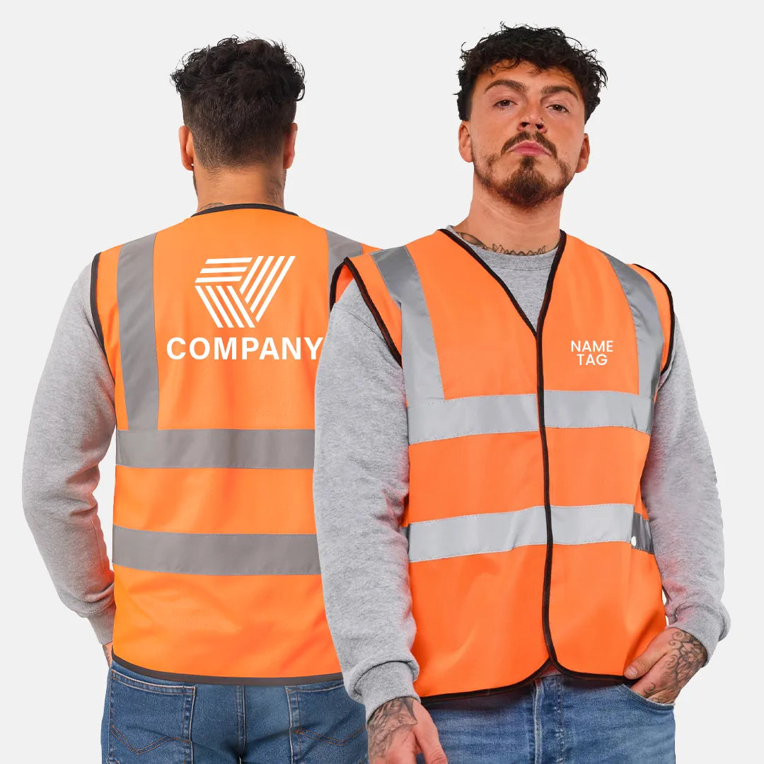Person wearing an orange safety vest with 'COMPANY' and 'NAME TAG' text on a plain background